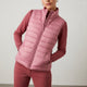 Women's sleeveless quilted vest with stand collar and front zip fastening