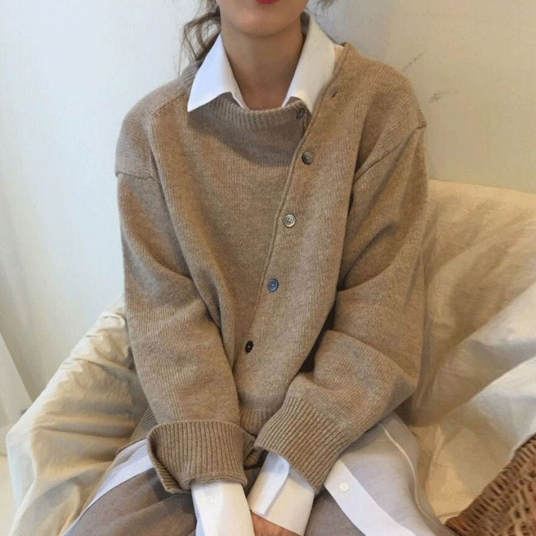 Women's button front cardigan sweater with long sleeves and ribbed trims