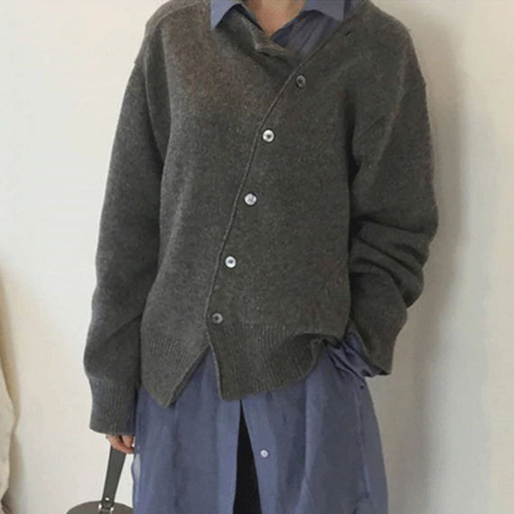 Women's button front cardigan sweater with long sleeves and ribbed trims