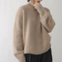 Women's long-sleeve turtleneck sweater with ribbed cuffs and hem