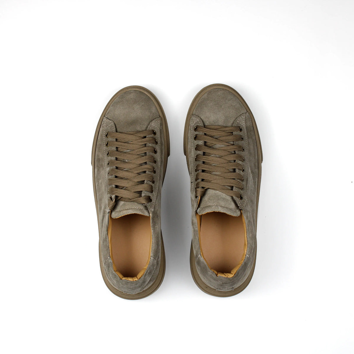 Taupe low-top lace-up sneakers with stitched panels and platform soles