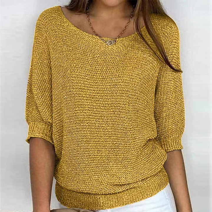 Women's lightweight knit sweater with scoop neckline and three-quarter sleeves