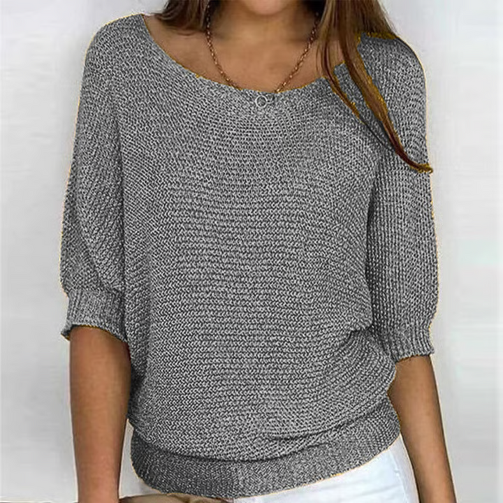 Women's lightweight knit sweater with scoop neckline and three-quarter sleeves