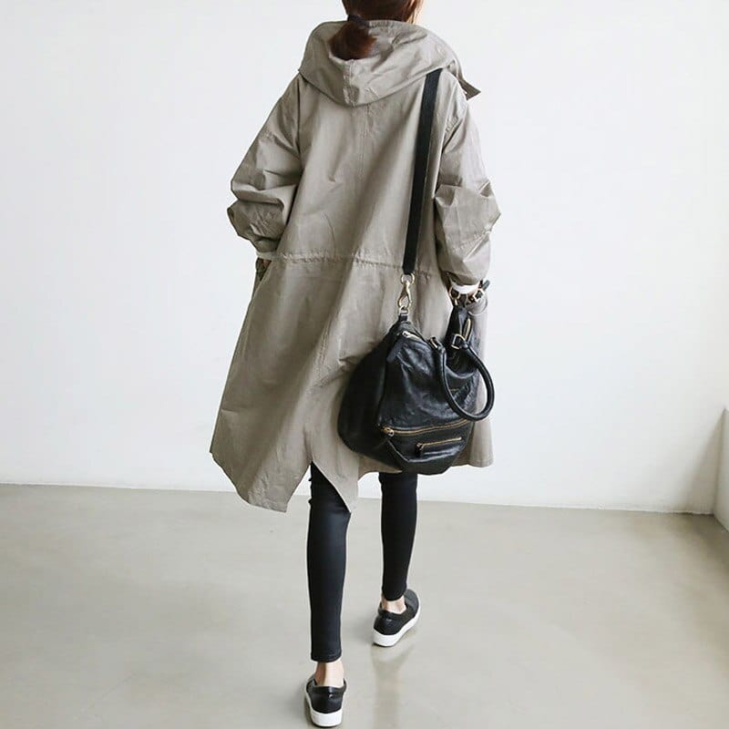 Women's long hooded raincoat with button front and patch pockets