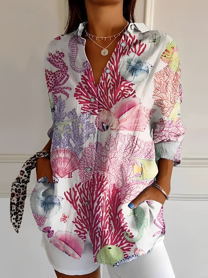 Women's patterned button-up shirt with collar and long sleeves
