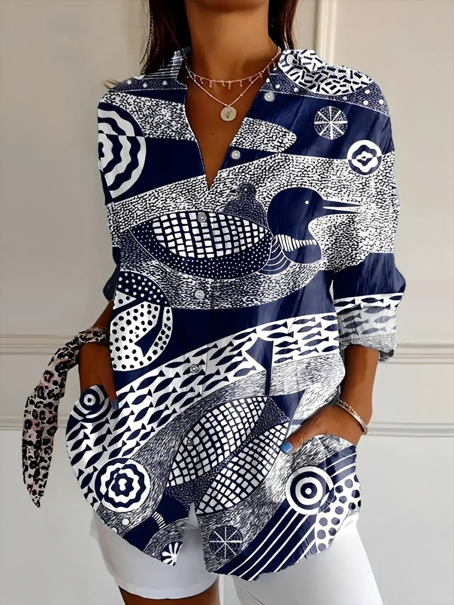 Women's patterned button-up shirt with collar and long sleeves