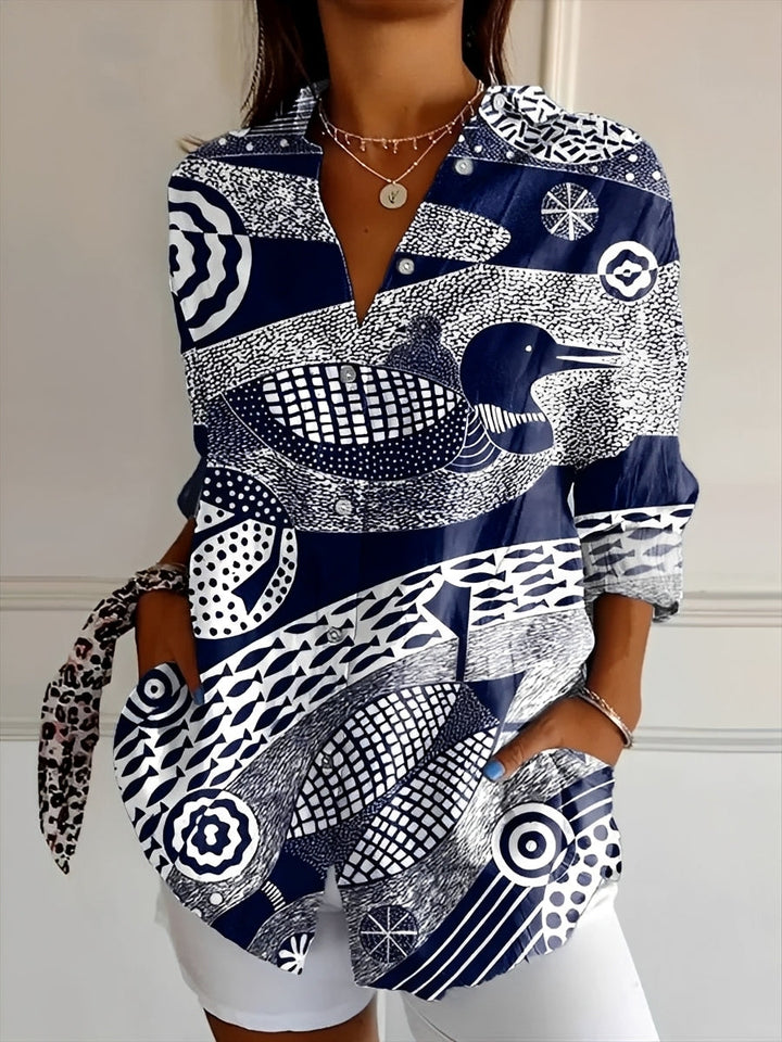 Women's patterned button-up shirt with collar and long sleeves