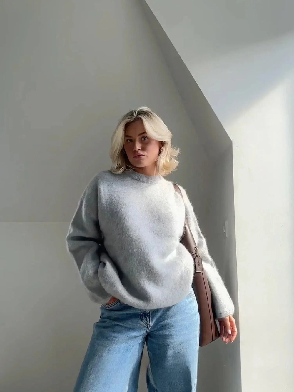 Women's oversized fuzzy knit sweater with crew neck and long sleeves