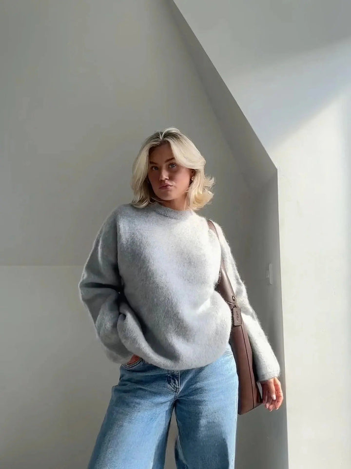 Women's oversized fuzzy knit sweater with crew neck and long sleeves