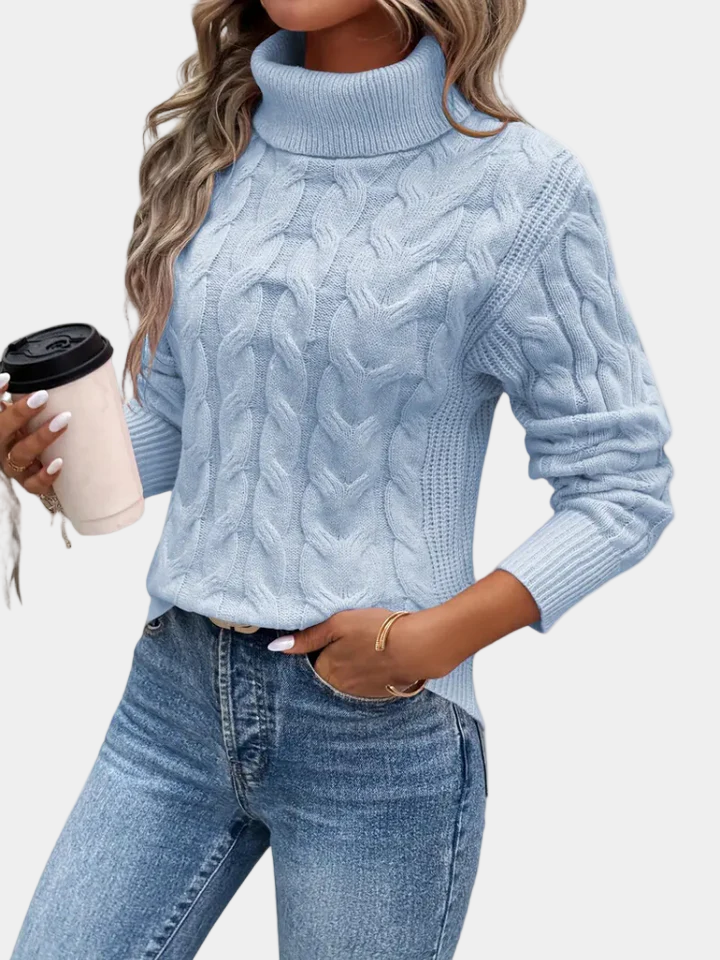 Women's cable knit turtleneck sweater with long sleeves