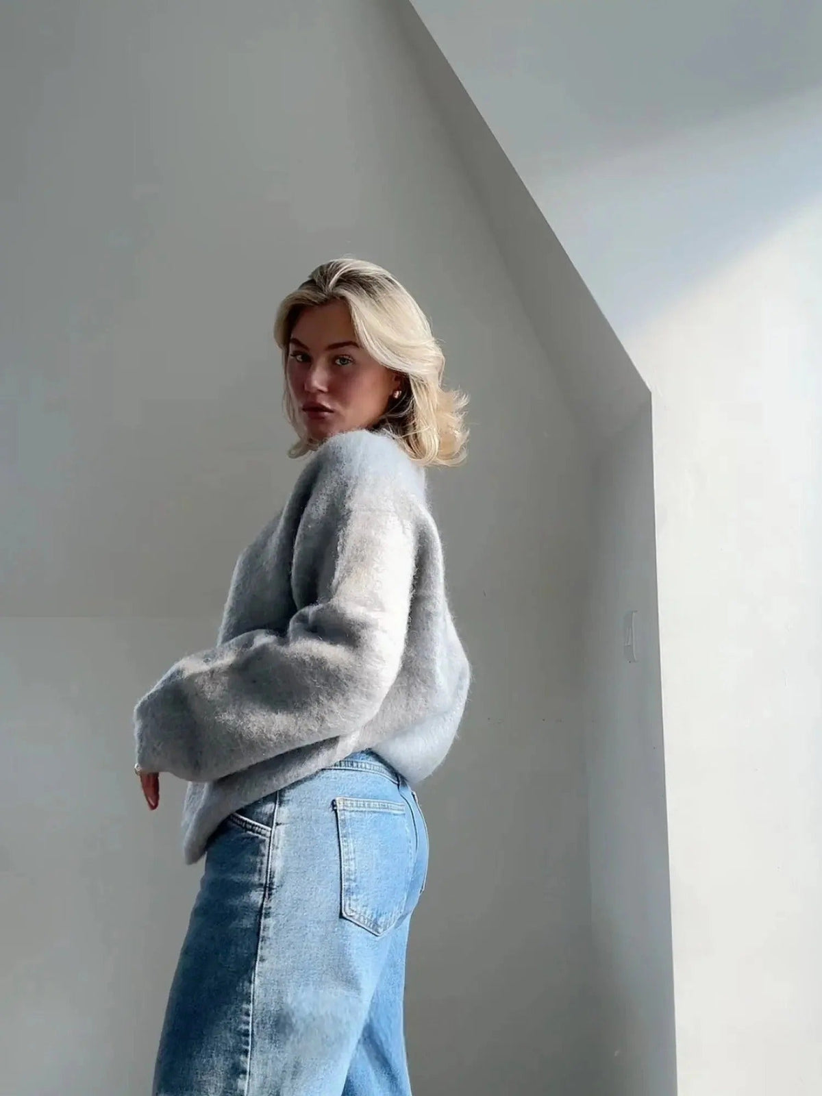 Women's oversized fuzzy knit sweater with crew neck and long sleeves