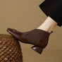Women's ankle boots with square toes, decorative buckle details and block heels