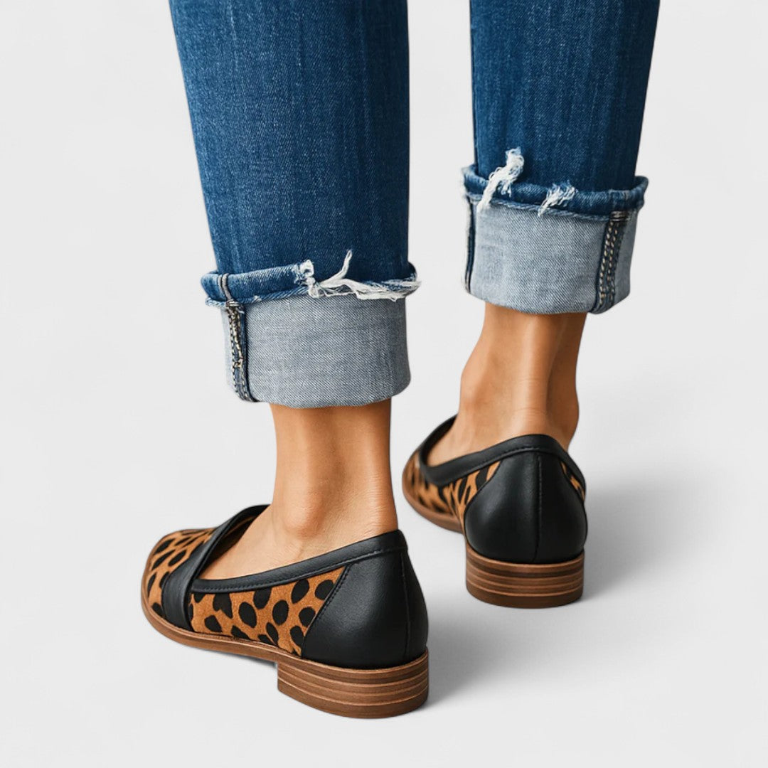 Women's pointed-toe slip-on loafers with vamp straps and low heels