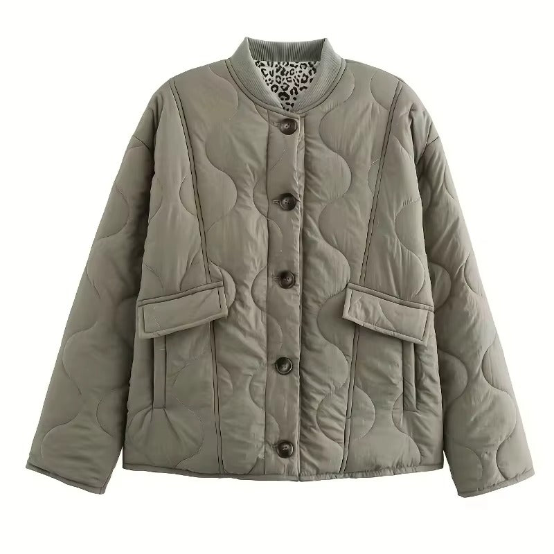 Women's quilted jacket with leopard-print cuffs, stand collar and patch pockets