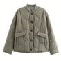 Women's quilted jacket with leopard-print cuffs, stand collar and patch pockets