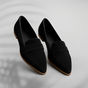 Women's pointed-toe penny loafers with low heels and vamp straps