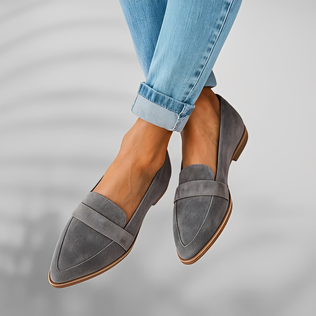 Women's pointed-toe penny loafers with low heels and vamp straps