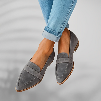 Women's pointed-toe penny loafers with low heels and vamp straps