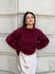 Women's oversized fuzzy knit sweater with crew neck and long sleeves