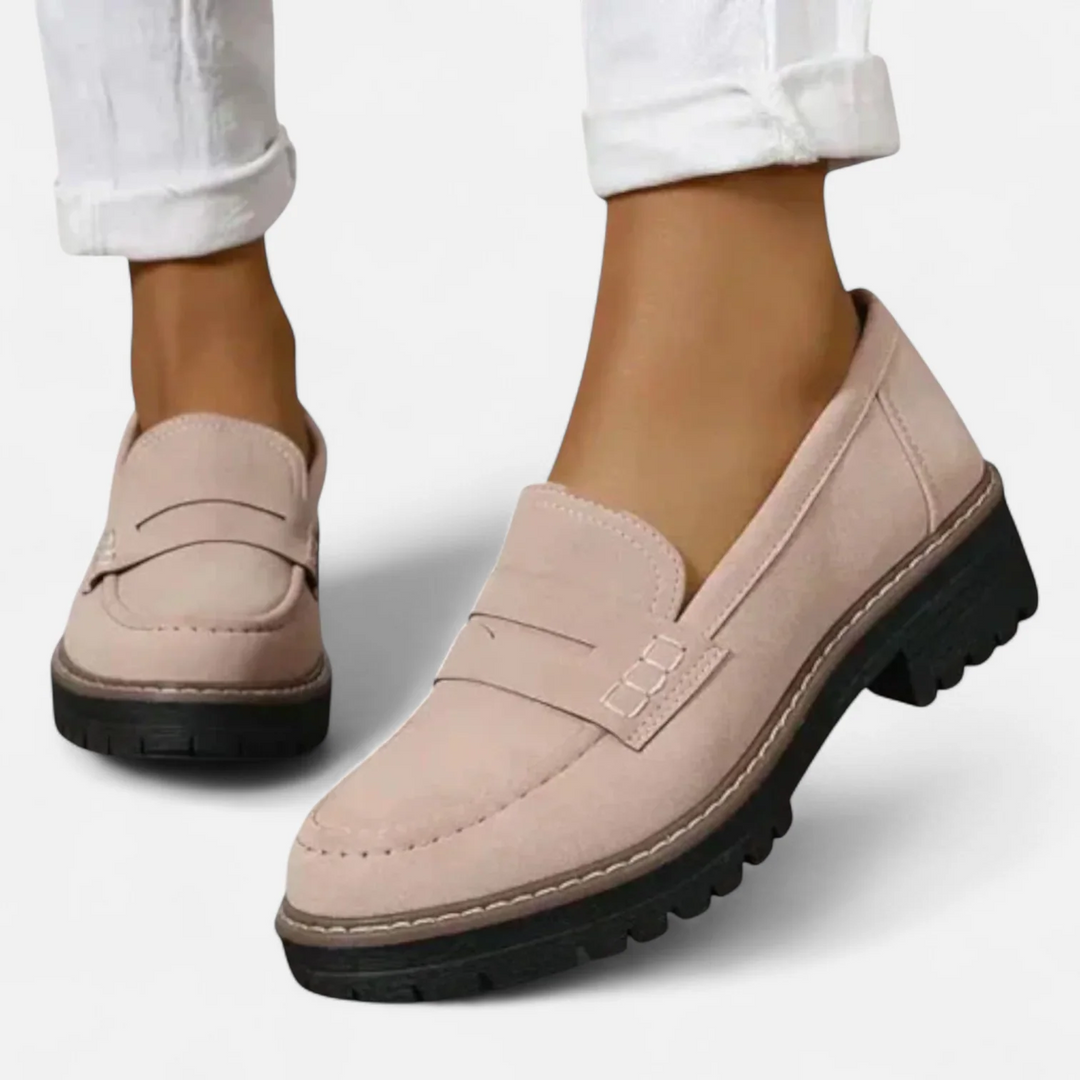 Women's penny loafers with chunky lug soles and stitched apron toes