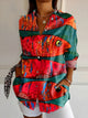 Women's patterned button-up shirt with collar and long sleeves