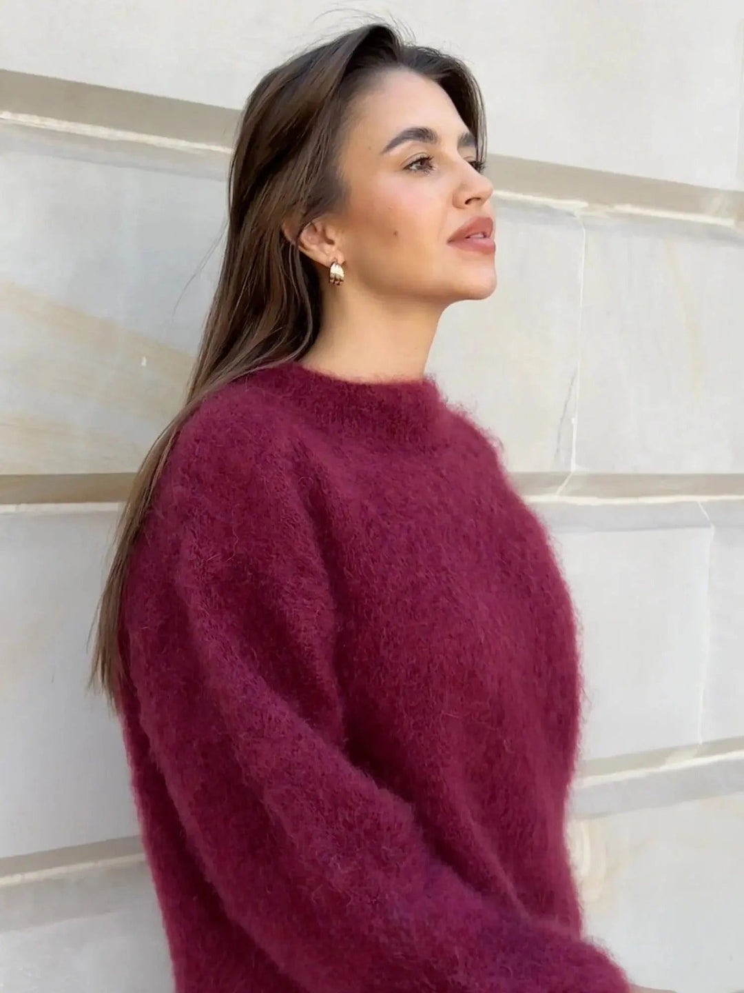 Women's oversized fuzzy knit sweater with crew neck and long sleeves