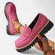 Women's penny loafers with chunky lug soles and stitched apron toes
