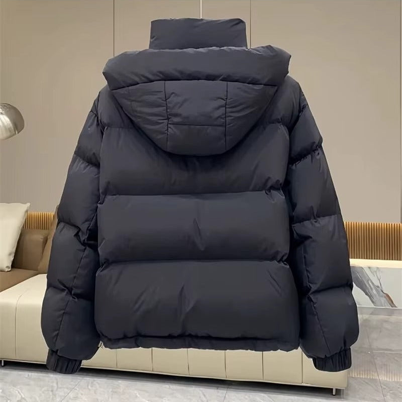 Women's hooded quilted puffer jacket with high neck, long sleeves and zip front