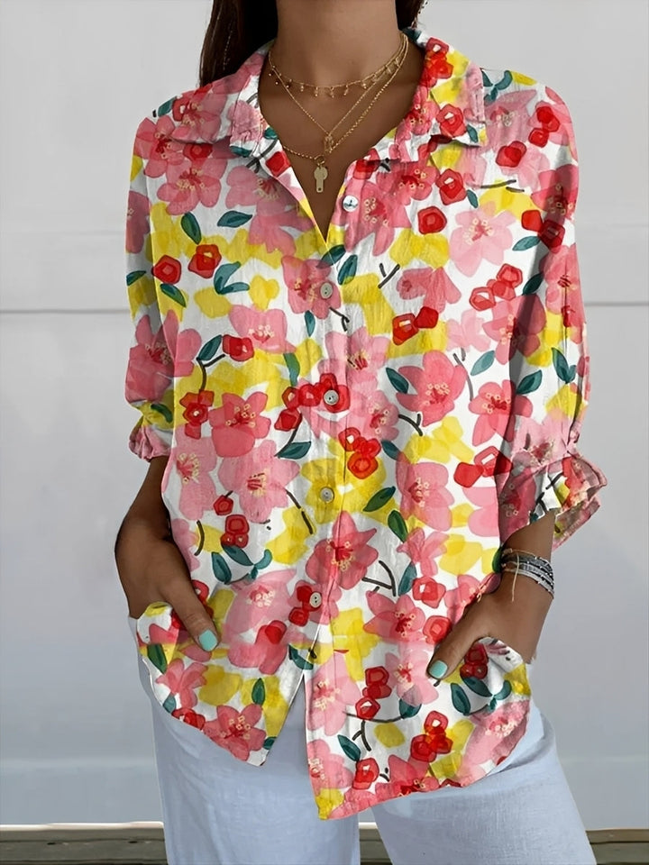 Women's patterned button-up shirt with collar and long sleeves