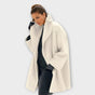 Women's longline jacket with wide lapels and long sleeves