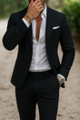 Men's tailored two-piece suit, single-breasted blazer with notch lapels and flat-front trousers