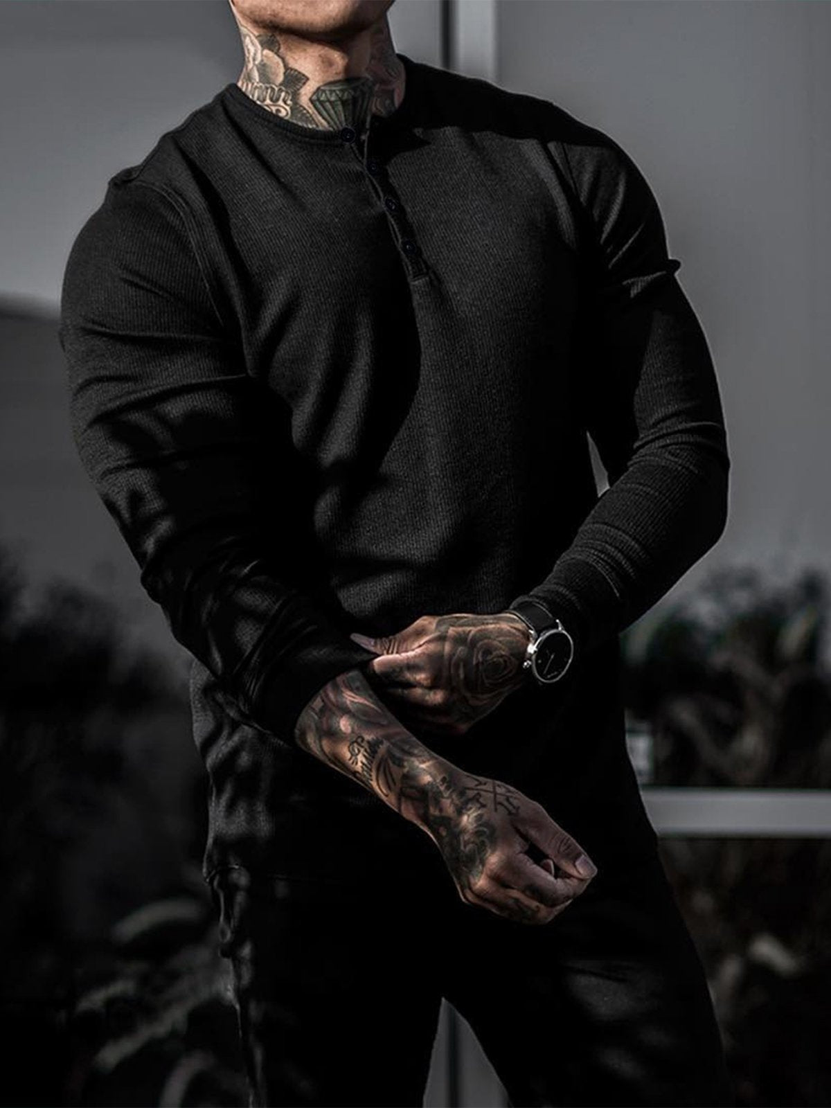 Men's long-sleeve ribbed henley sweater with button placket