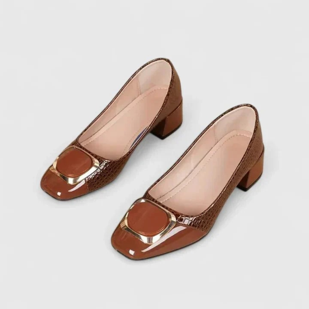 Women's pointed-toe embossed loafer pumps with block heels and decorative buckle details
