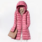 Women's hooded quilted longline puffer jacket with zip front