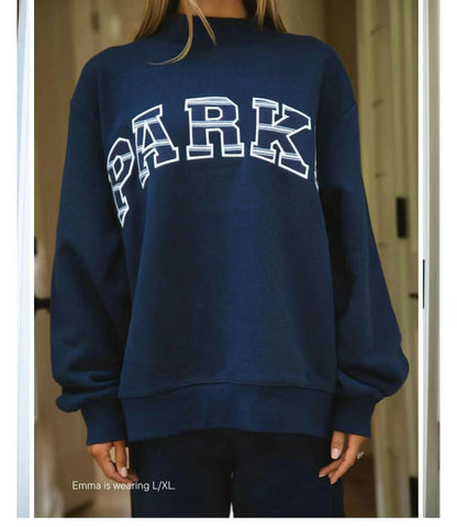 Women's oversized varsity sweatshirt with mock neck and front lettering