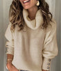 Women's ribbed turtleneck sweater with long sleeves and button cuffs