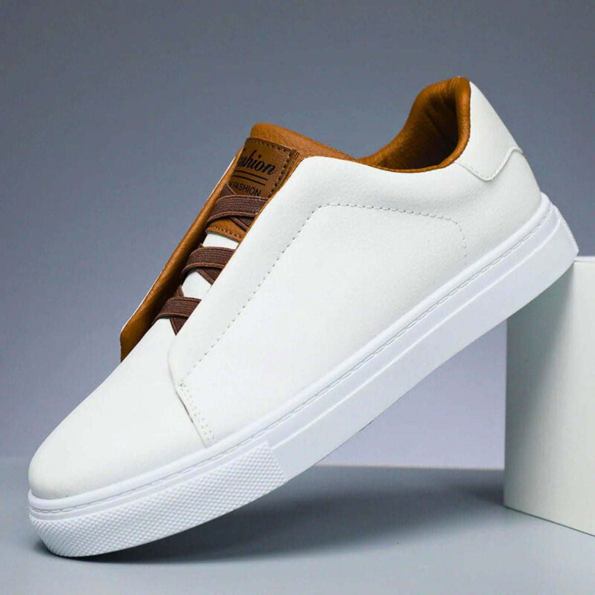 Low-top lace-up sneaker with panelled upper and contrast rubber sole