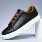 Low-top lace-up sneaker with panelled upper and contrast rubber sole