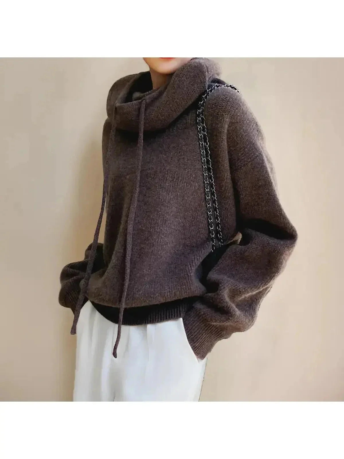 Women's hooded knit sweater with drawstrings and ribbed trims