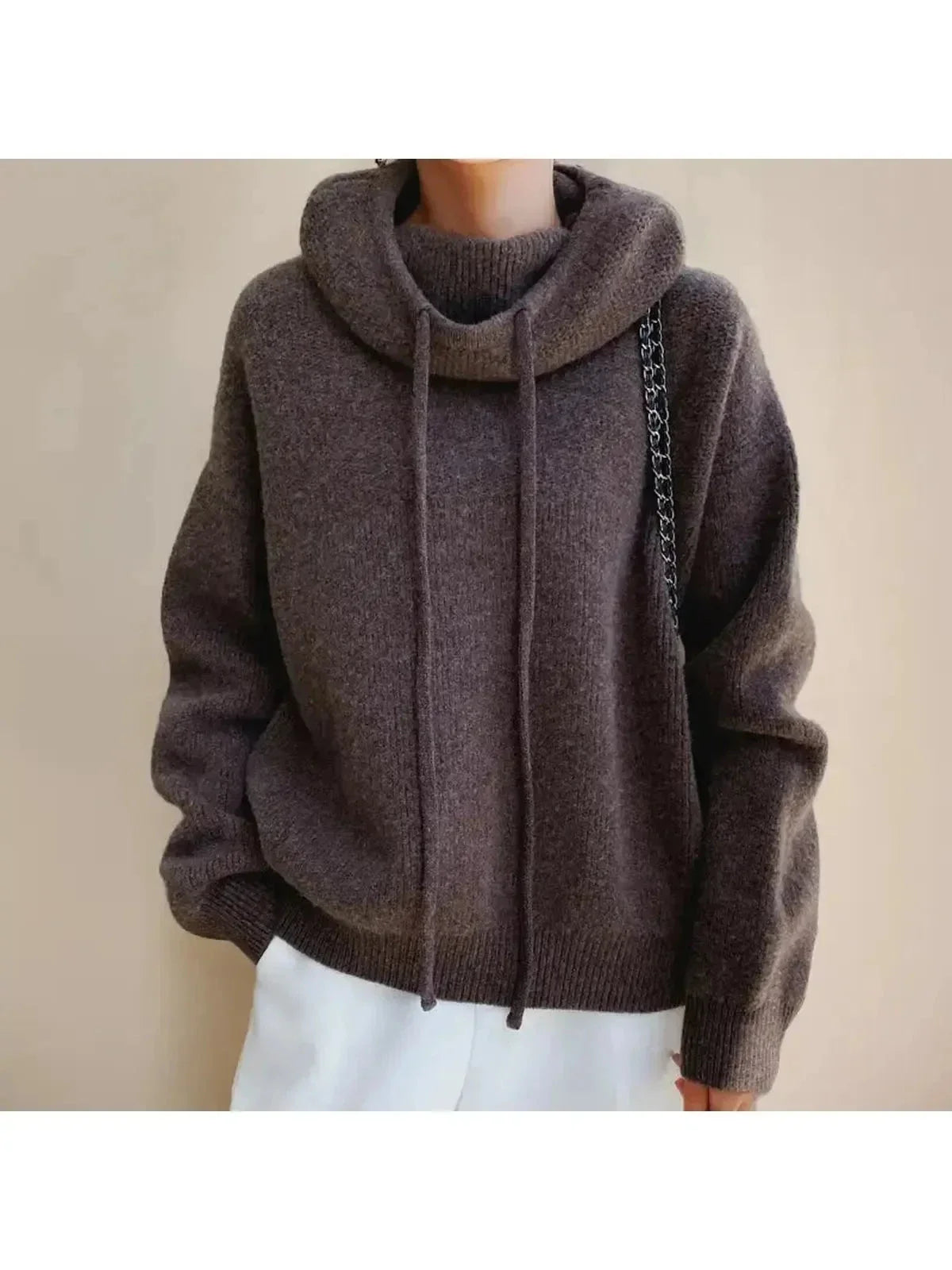 Women's hooded knit sweater with drawstrings and ribbed trims
