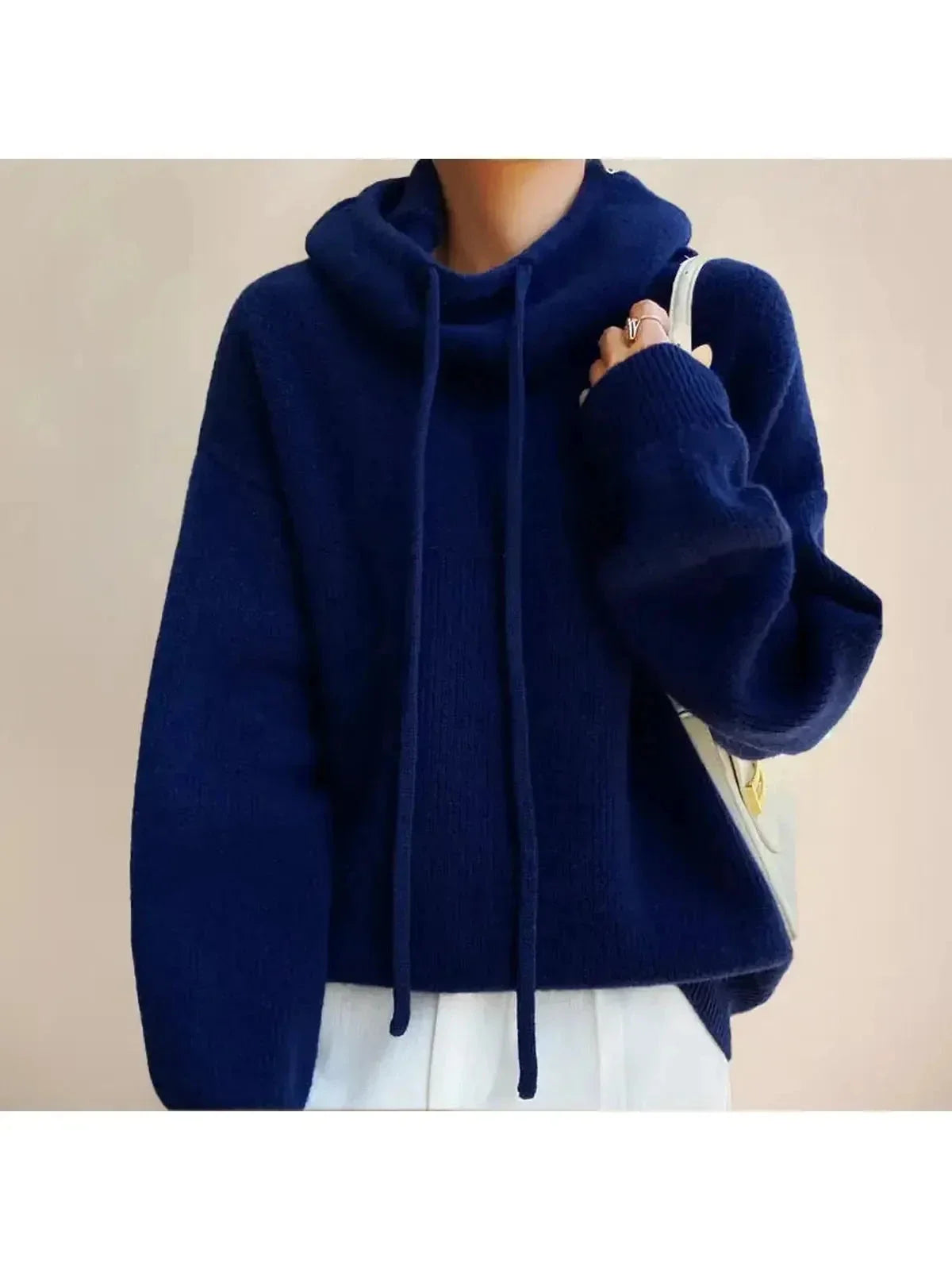 Women's hooded knit sweater with drawstrings and ribbed trims