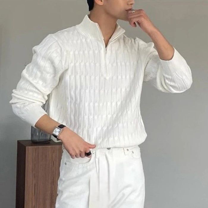Half zip ribbed sweater in cream and black with crew neckline and long sleeves