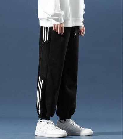 Men's tapered jogger pants with contrast side stripes and elastic cuffs