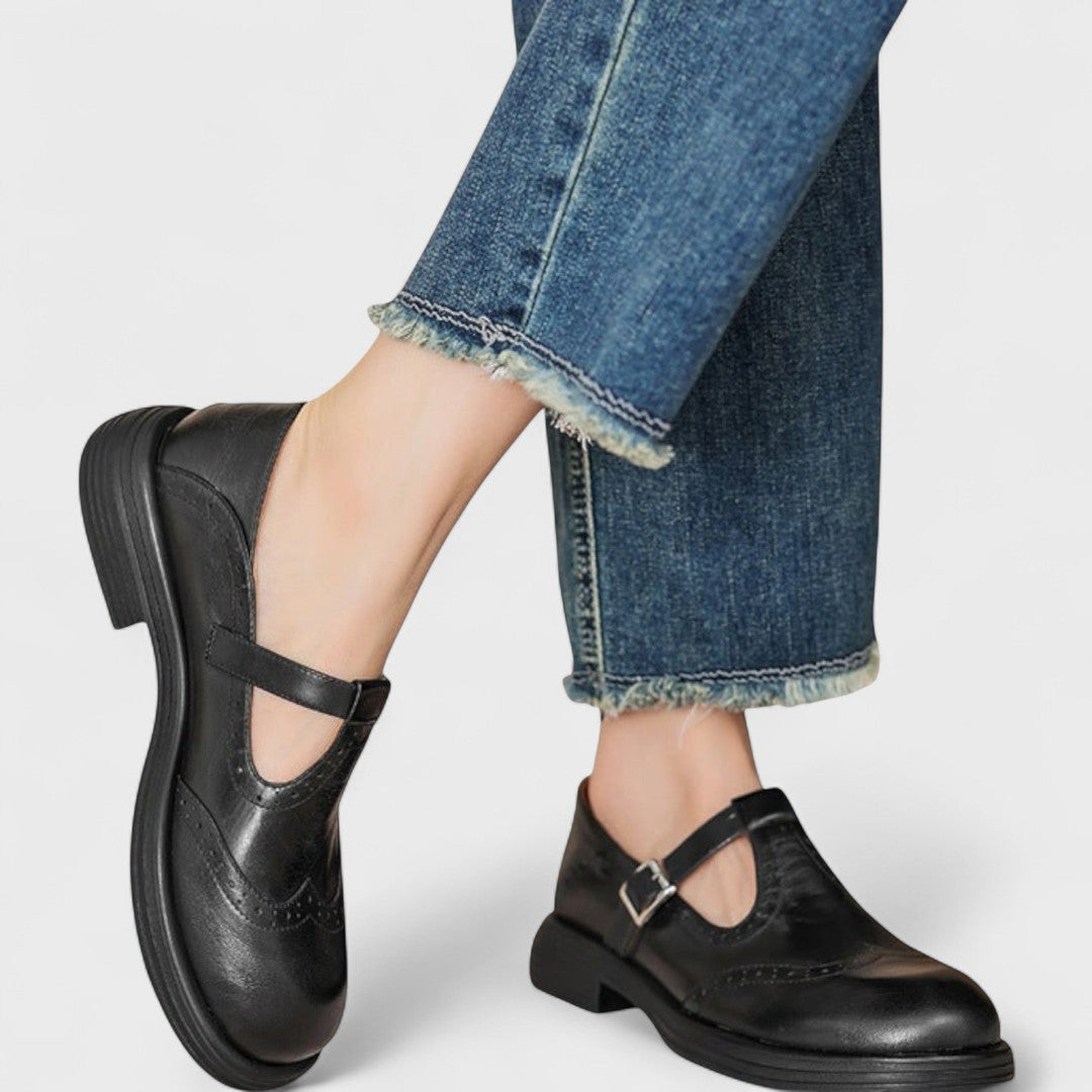 Women's Mary Jane shoes with brogue detailing, buckle strap and low heel