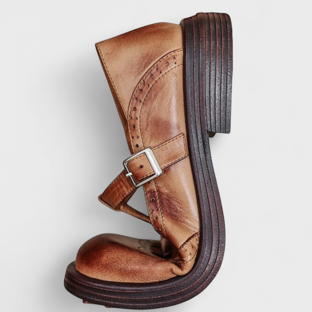 Women's Mary Jane shoes with brogue detailing, buckle strap and low heel