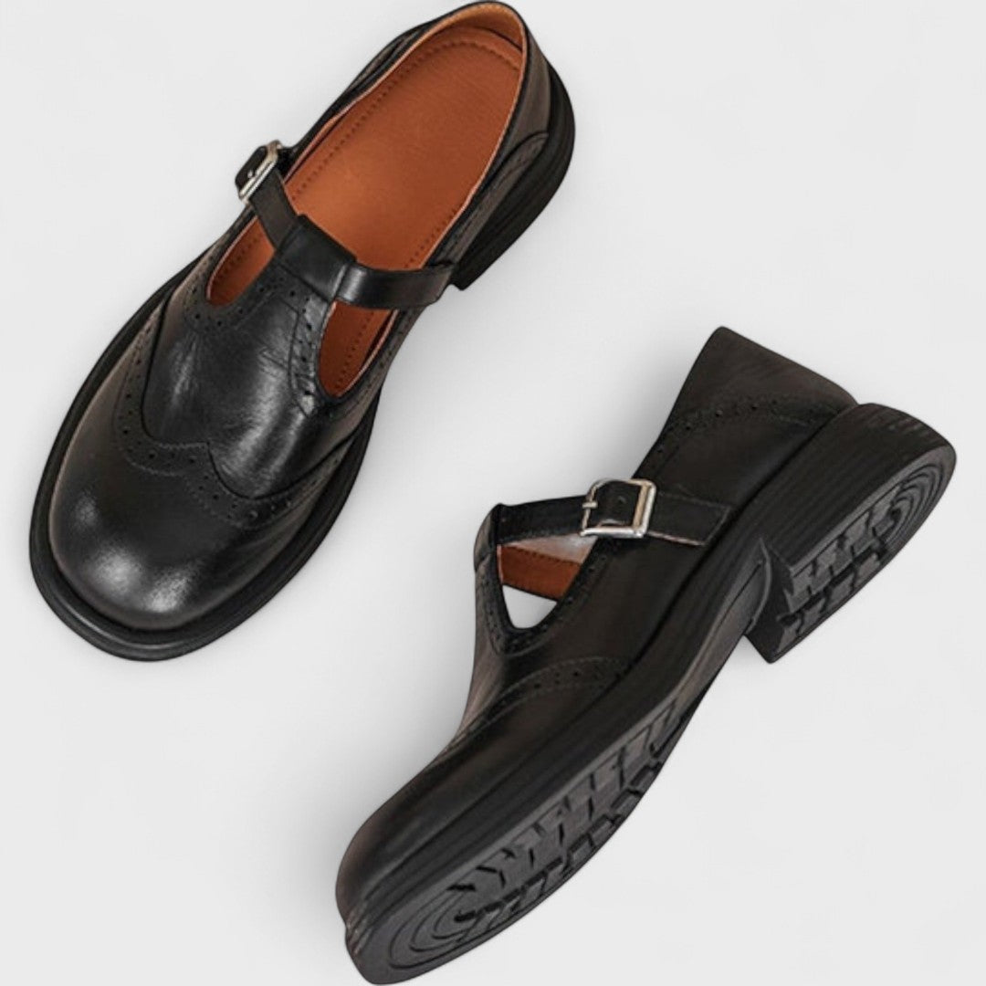 Women's Mary Jane shoes with brogue detailing, buckle strap and low heel