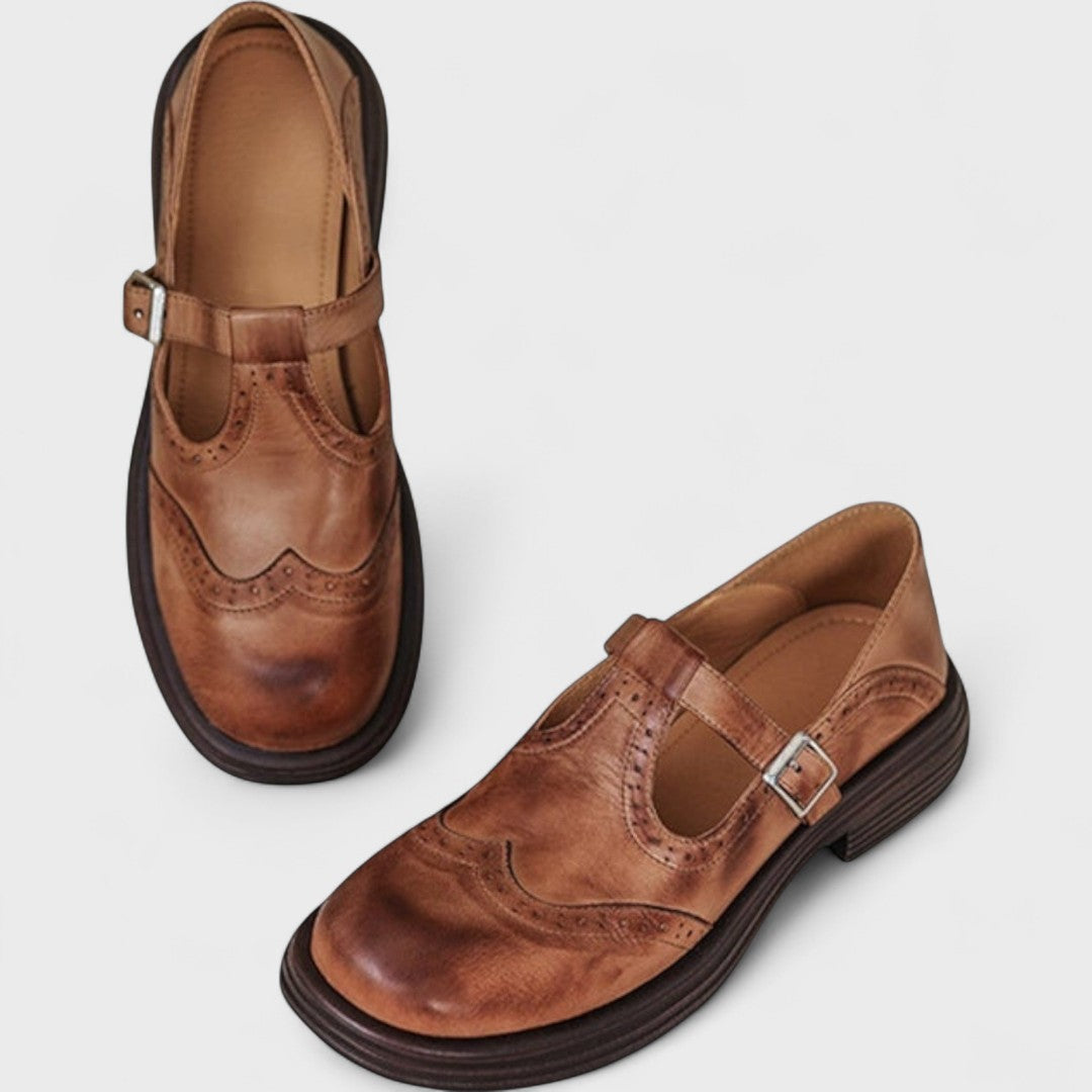 Women's Mary Jane shoes with brogue detailing, buckle strap and low heel
