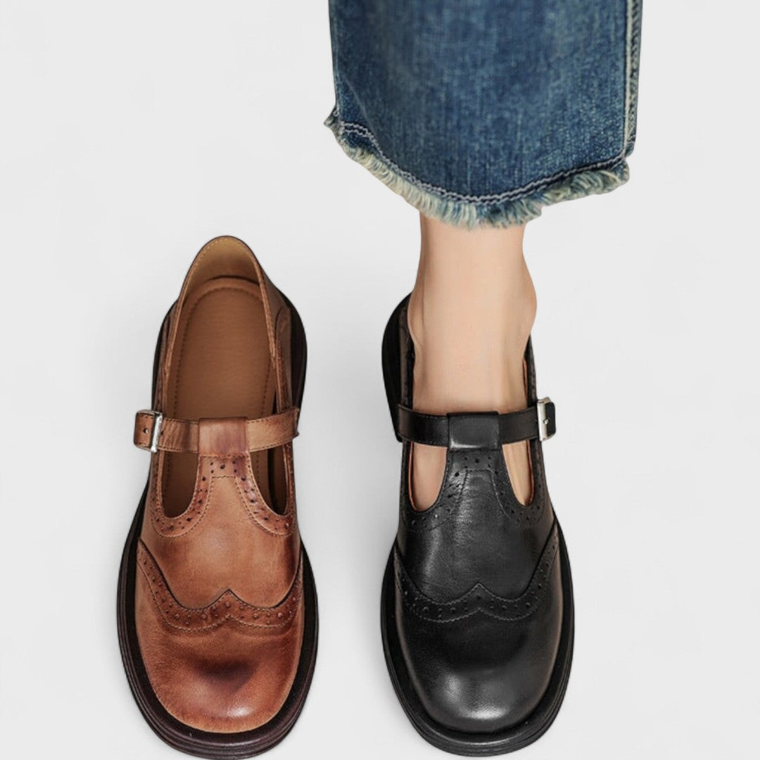 Women's Mary Jane shoes with brogue detailing, buckle strap and low heel