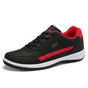 Men's low-top lace-up sneakers with contrast stripe and layered sole