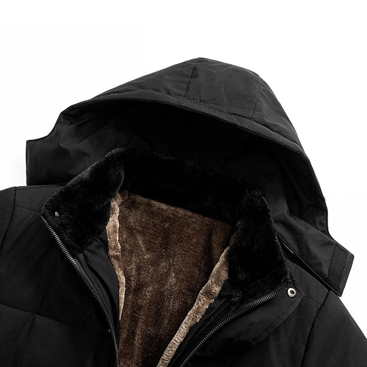 Men's black quilted puffer jacket with hood and flap pockets